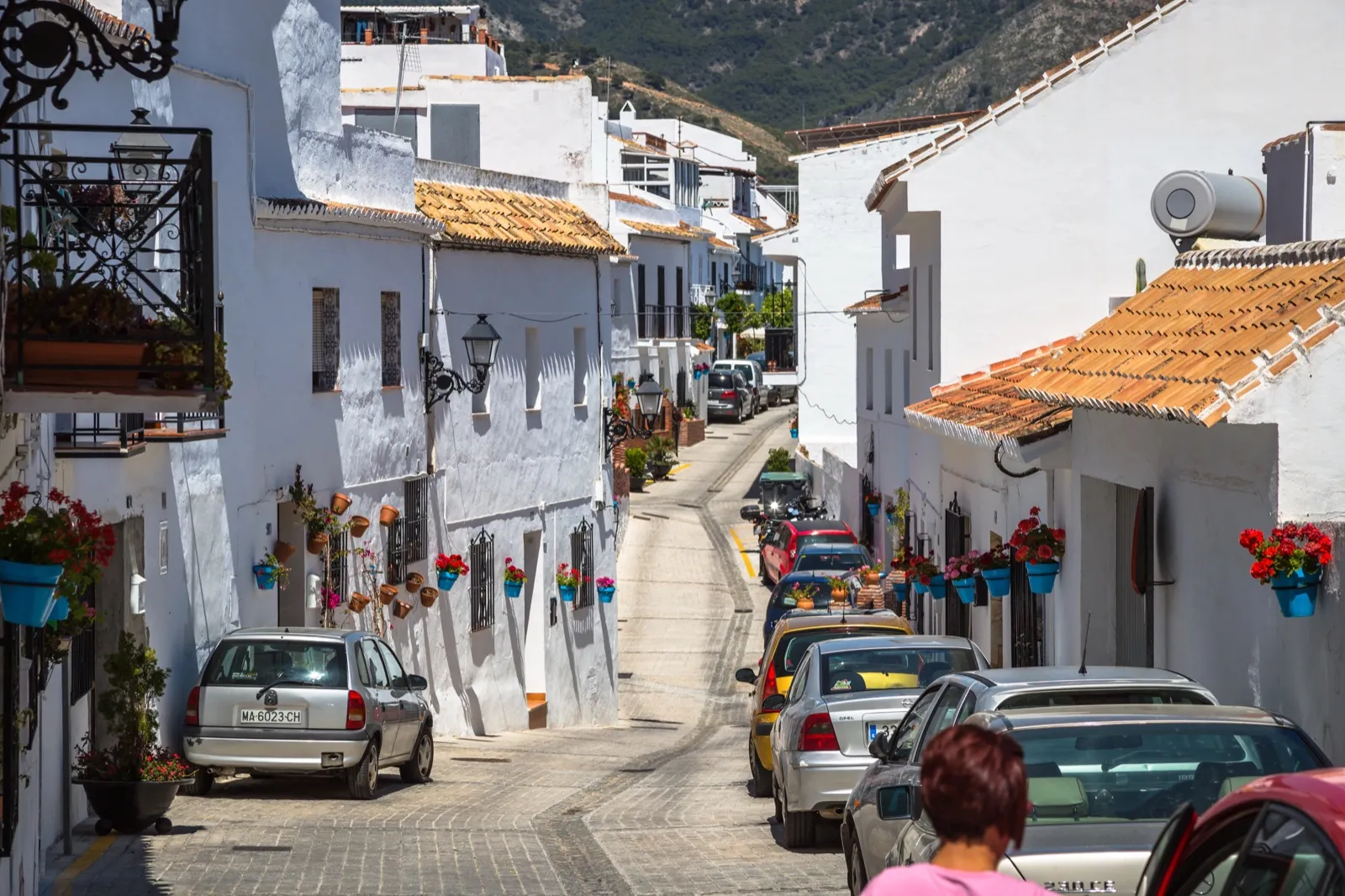 A flower-filled whitewashed lane in Mijas Pueblo